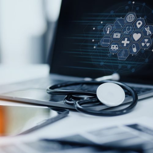 Doctor stethoscope with laptop on desk, Healthcare and medical service concept.