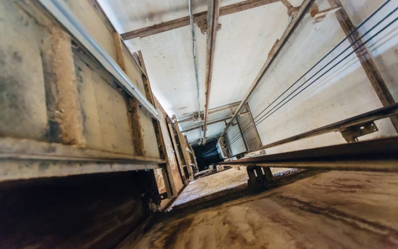 Old freight elevator shaft. View down.