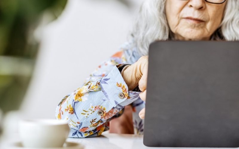 Senior woman working on a laptop