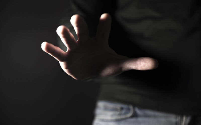 Hand reaching or attacking