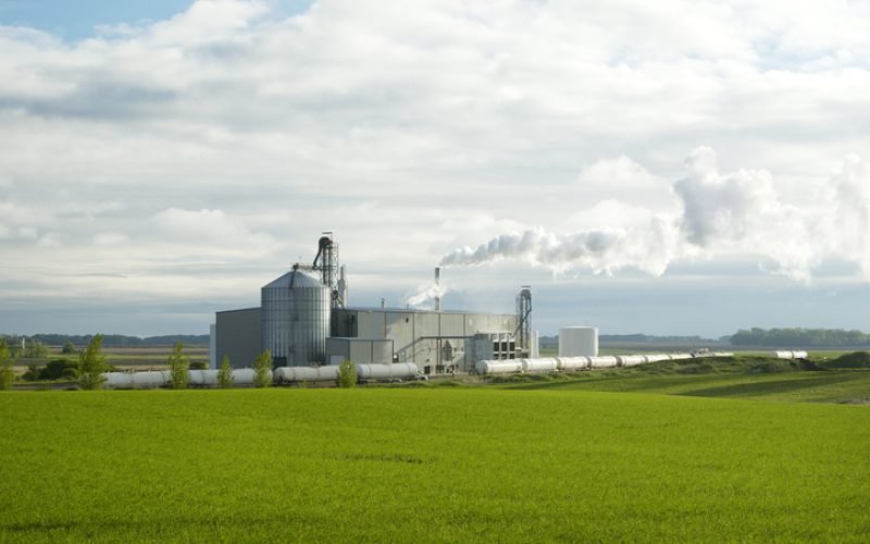 Ethanol production plant utilizing corn as a feed stock located in the middle of farm land in the Dakotas.